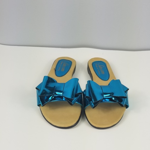 Shoes - bow tie Metalic blue flipflop sliders shoes.